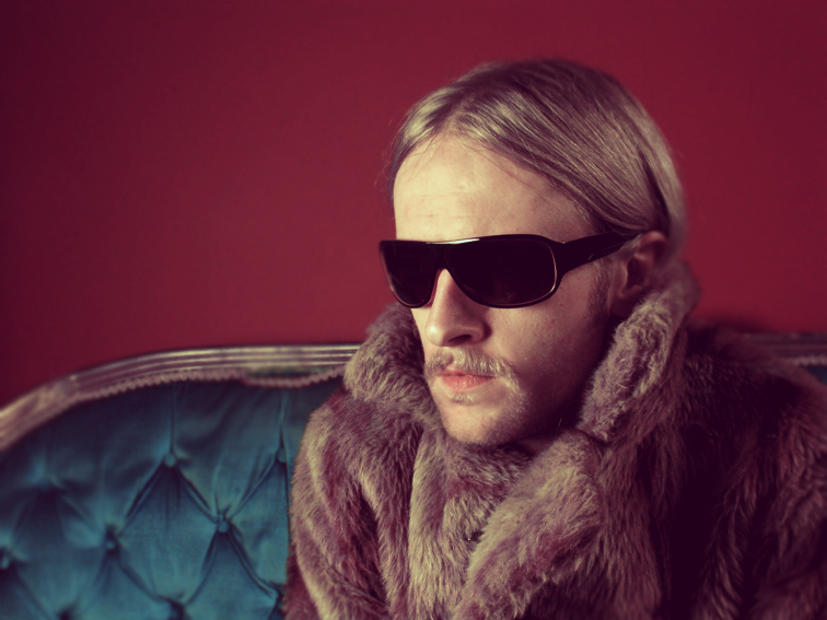 Serious Composer TAKE 1 - Photo by Twm Gardner Image of John in Fur Coat